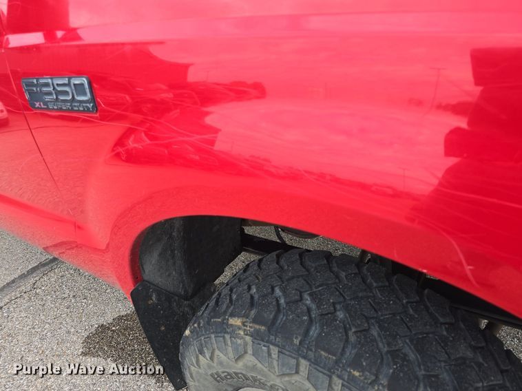 image for item DQ4490 2000 Ford F350 Super Duty XL SuperCab flatbed pickup truck