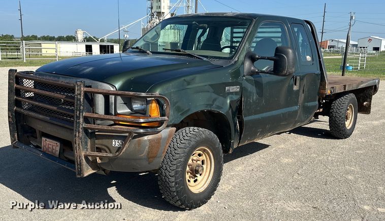 image for item EJ4471 2000 Ford F250 Super Duty SuperCab flatbed pickup truck