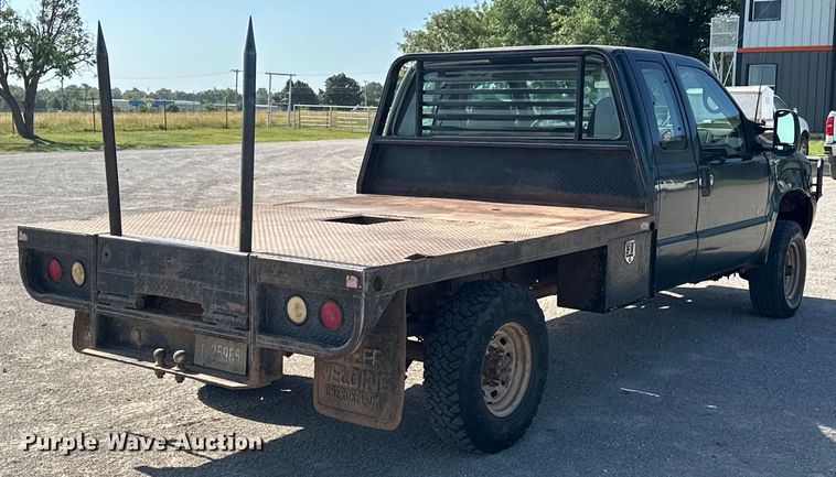 image for item EJ4471 2000 Ford F250 Super Duty SuperCab flatbed pickup truck