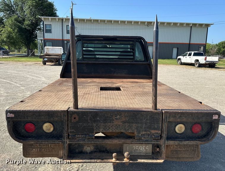 image for item EJ4471 2000 Ford F250 Super Duty SuperCab flatbed pickup truck