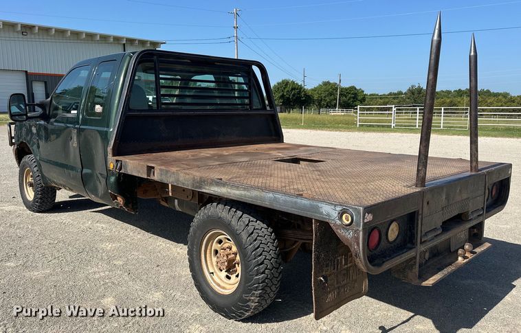 image for item EJ4471 2000 Ford F250 Super Duty SuperCab flatbed pickup truck