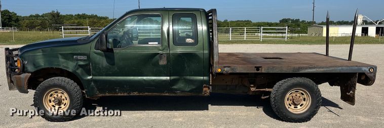 image for item EJ4471 2000 Ford F250 Super Duty SuperCab flatbed pickup truck