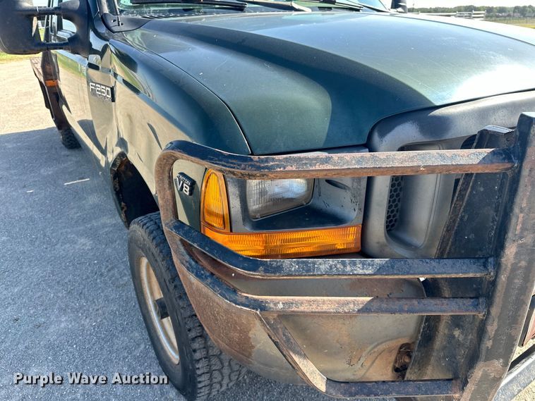 image for item EJ4471 2000 Ford F250 Super Duty SuperCab flatbed pickup truck