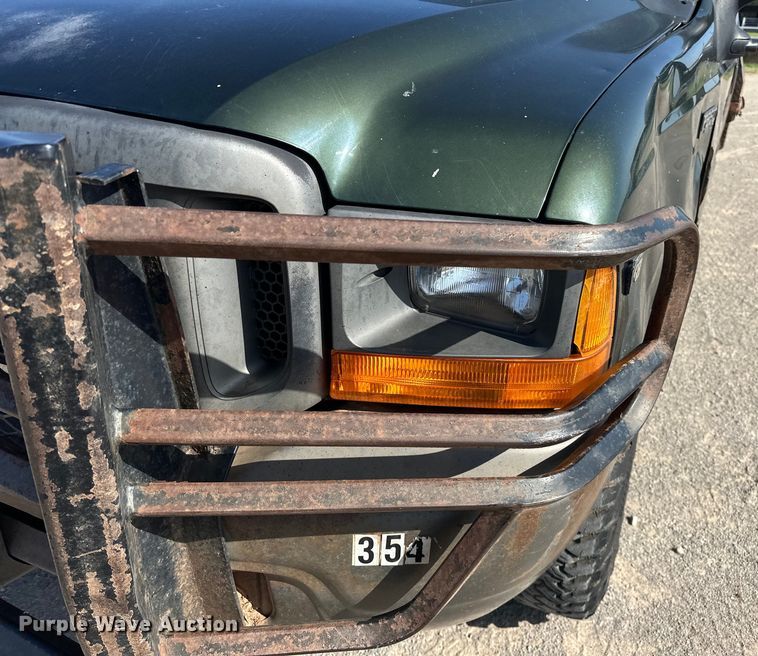 image for item EJ4471 2000 Ford F250 Super Duty SuperCab flatbed pickup truck