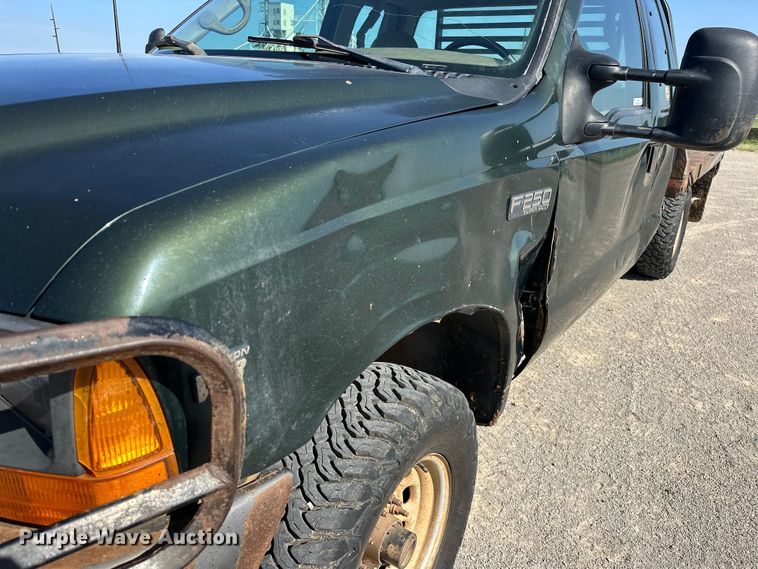 image for item EJ4471 2000 Ford F250 Super Duty SuperCab flatbed pickup truck