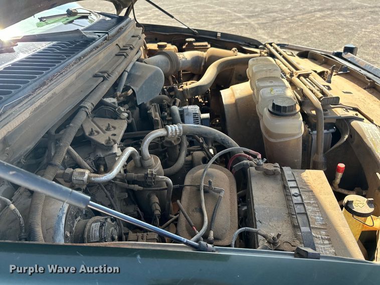 image for item EJ4471 2000 Ford F250 Super Duty SuperCab flatbed pickup truck