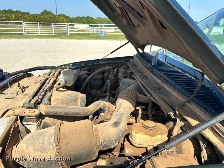 image for item EJ4471 2000 Ford F250 Super Duty SuperCab flatbed pickup truck