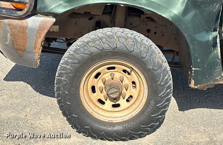 image for item EJ4471 2000 Ford F250 Super Duty SuperCab flatbed pickup truck