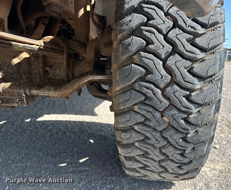 image for item EJ4471 2000 Ford F250 Super Duty SuperCab flatbed pickup truck