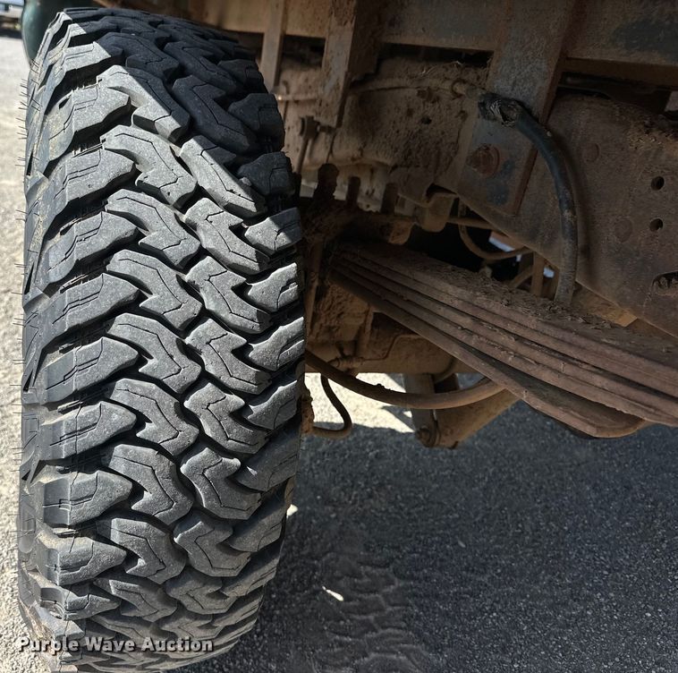 image for item EJ4471 2000 Ford F250 Super Duty SuperCab flatbed pickup truck