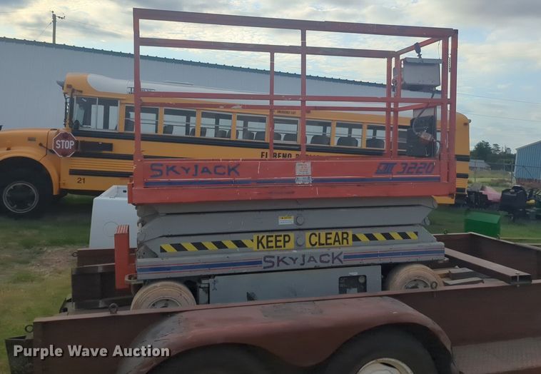 image for item NG9873 Skyjack SJIII 3220 scissor lift with trailer