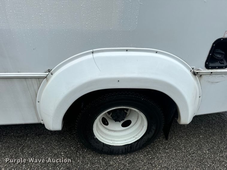 image for item OF9960 2010 Ford E450 Super Duty shuttle bus