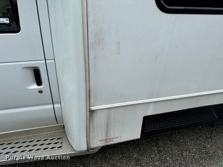image for item OF9960 2010 Ford E450 Super Duty shuttle bus