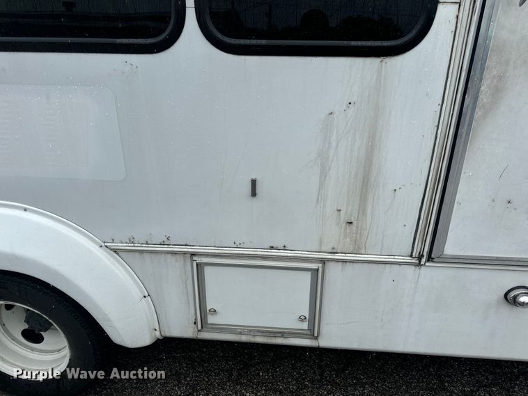 image for item OF9960 2010 Ford E450 Super Duty shuttle bus