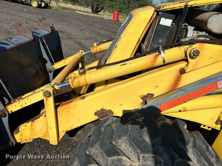 image for item OM9611 New Holland LB110 backhoe