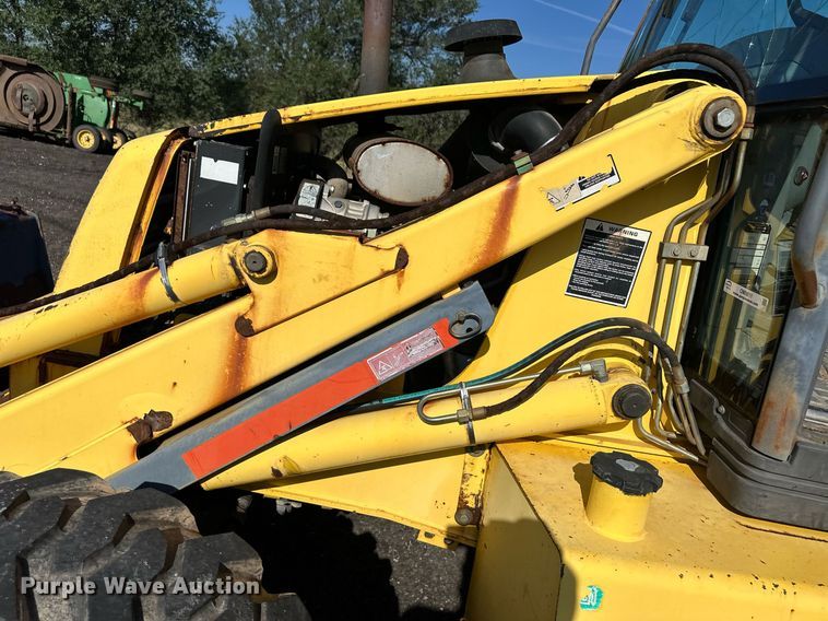 image for item OM9611 New Holland LB110 backhoe
