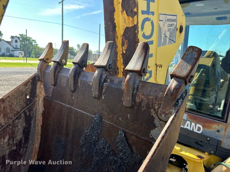 image for item OM9611 New Holland LB110 backhoe