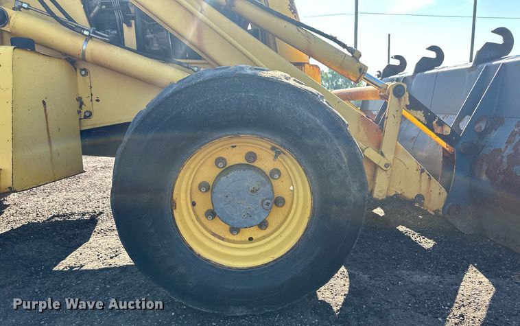 image for item OM9611 New Holland LB110 backhoe