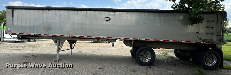 image for item EE7486 2011 Mac end dump trailer