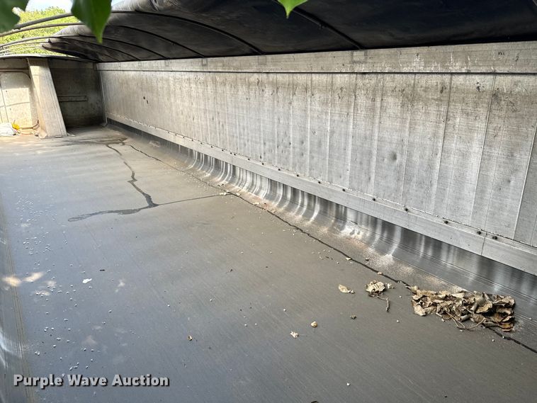 image for item EE7486 2011 Mac end dump trailer