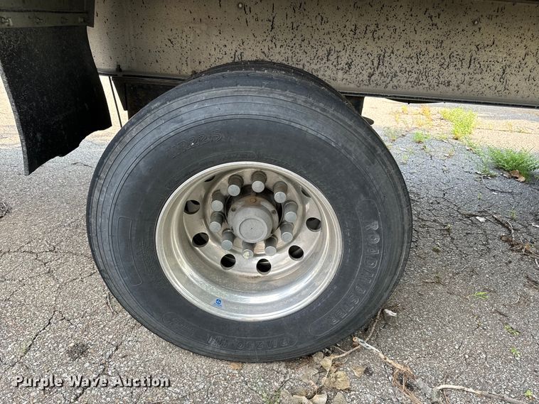 image for item EE7486 2011 Mac end dump trailer