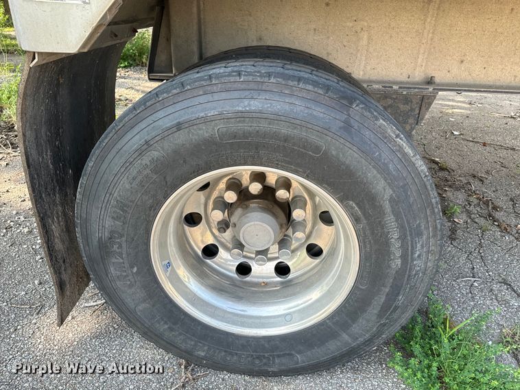 image for item EE7486 2011 Mac end dump trailer