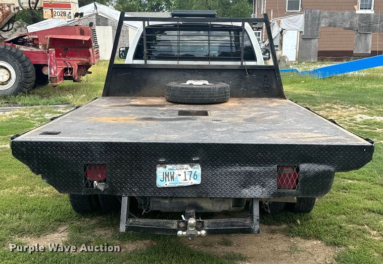 image for item DX1068 2008 Dodge Ram 3500 Quad Cab flatbed pickup truck