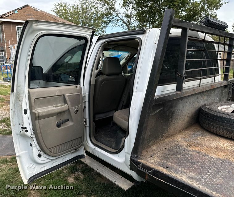 image for item DX1068 2008 Dodge Ram 3500 Quad Cab flatbed pickup truck