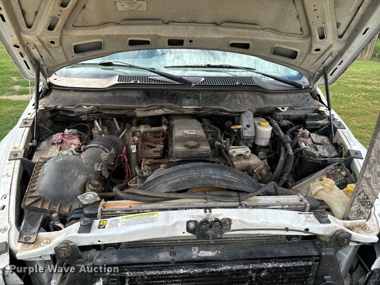 image for item DX1068 2008 Dodge Ram 3500 Quad Cab flatbed pickup truck