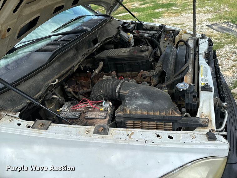 image for item DX1068 2008 Dodge Ram 3500 Quad Cab flatbed pickup truck