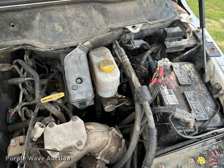 image for item DX1068 2008 Dodge Ram 3500 Quad Cab flatbed pickup truck