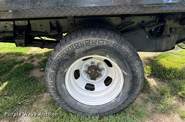 image for item DX1068 2008 Dodge Ram 3500 Quad Cab flatbed pickup truck