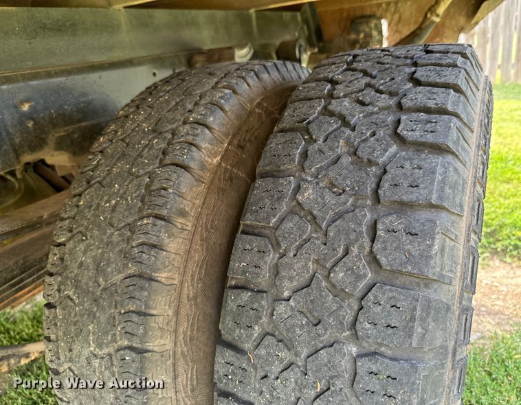 image for item DX1068 2008 Dodge Ram 3500 Quad Cab flatbed pickup truck