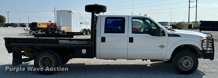 image for item DX1103 2012 Ford F350 Super Duty XL Crew Cab flatbed pickup truck