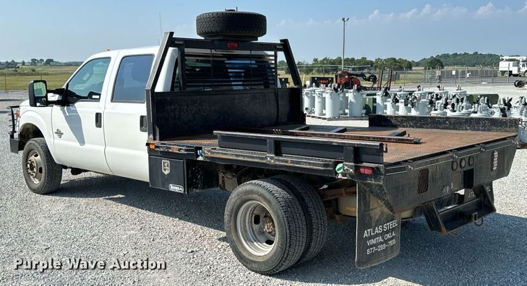 image for item DX1103 2012 Ford F350 Super Duty XL Crew Cab flatbed pickup truck