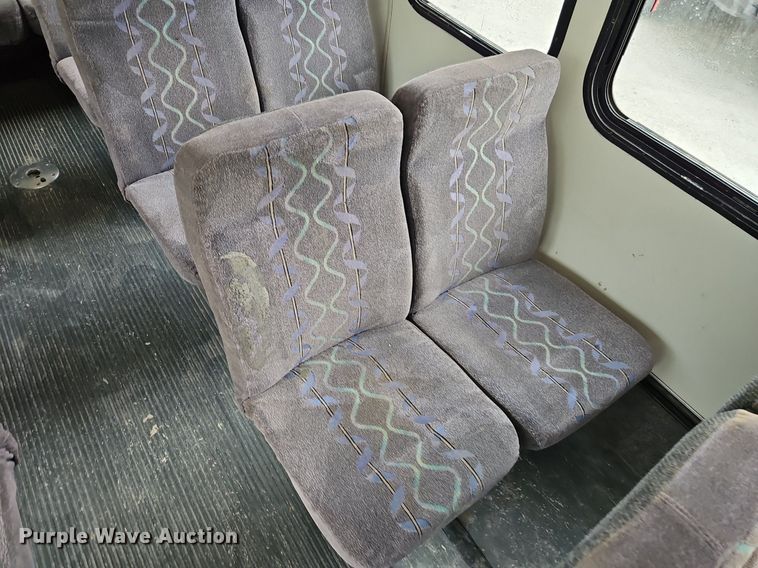 image for item EI8254 1999 Ford E450 Super Duty shuttle bus