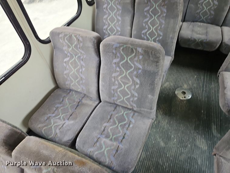 image for item EI8254 1999 Ford E450 Super Duty shuttle bus