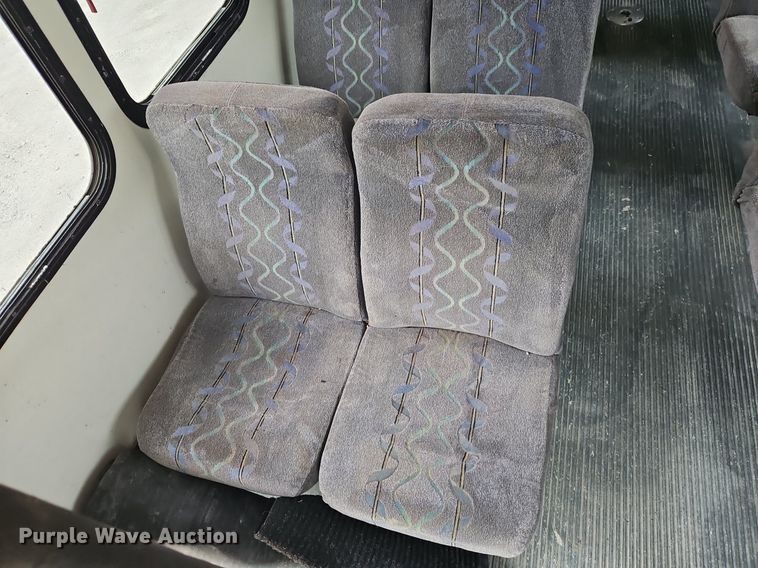 image for item EI8254 1999 Ford E450 Super Duty shuttle bus