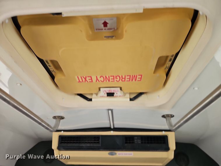 image for item EI8254 1999 Ford E450 Super Duty shuttle bus