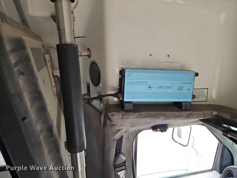 image for item EI8254 1999 Ford E450 Super Duty shuttle bus