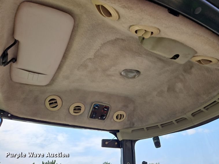 image for item EI8258 2013 John Deere 4320 MFWD tractor