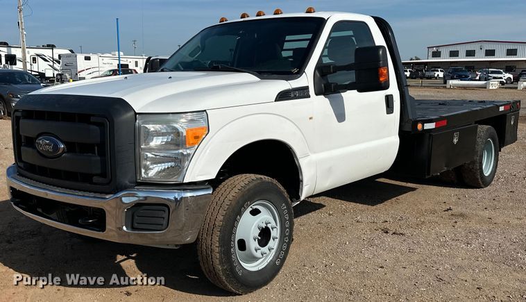 image for item EJ8846 2014 Ford F350 Super Duty flatbed pickup truck