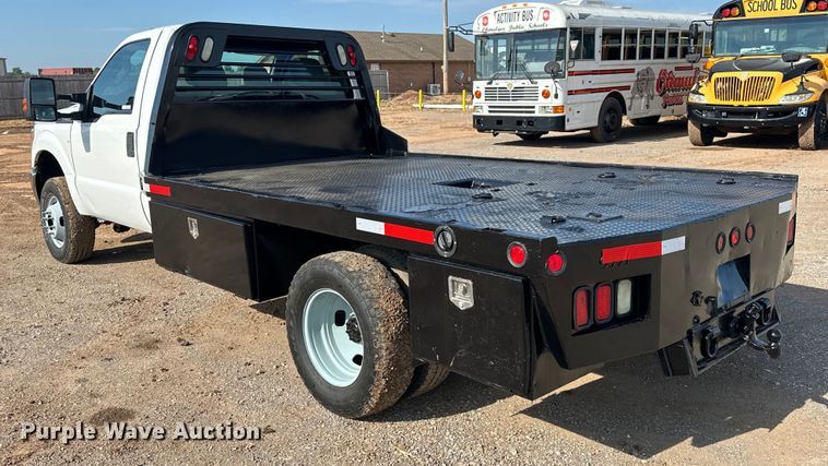 image for item EJ8846 2014 Ford F350 Super Duty flatbed pickup truck