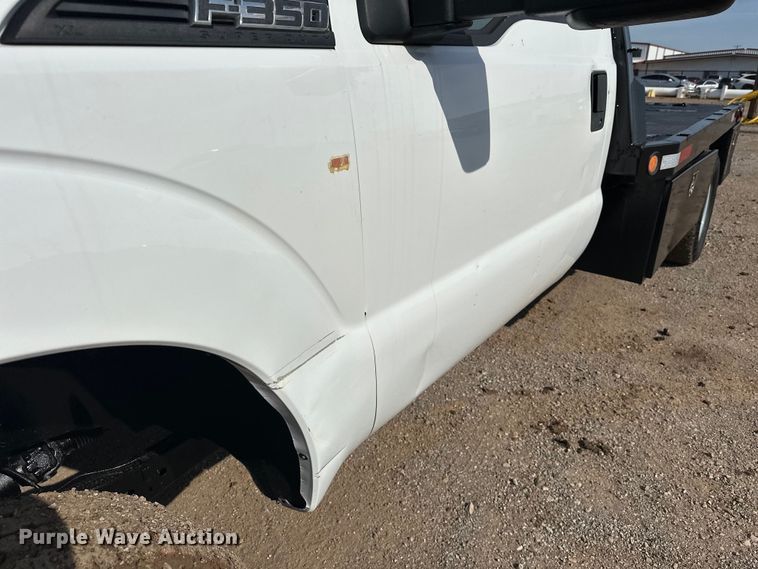 image for item EJ8846 2014 Ford F350 Super Duty flatbed pickup truck