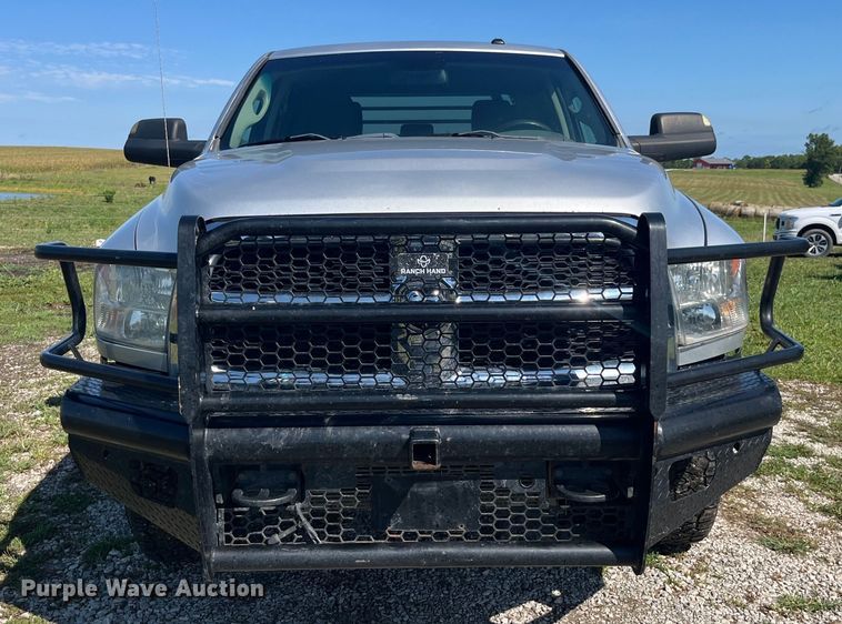 image for item EK8932 2015 Dodge Ram 3500HD Crew Cab flatbed pickup truck