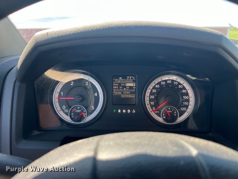 image for item EK8932 2015 Dodge Ram 3500HD Crew Cab flatbed pickup truck