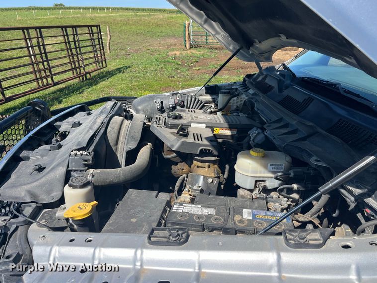 image for item EK8932 2015 Dodge Ram 3500HD Crew Cab flatbed pickup truck