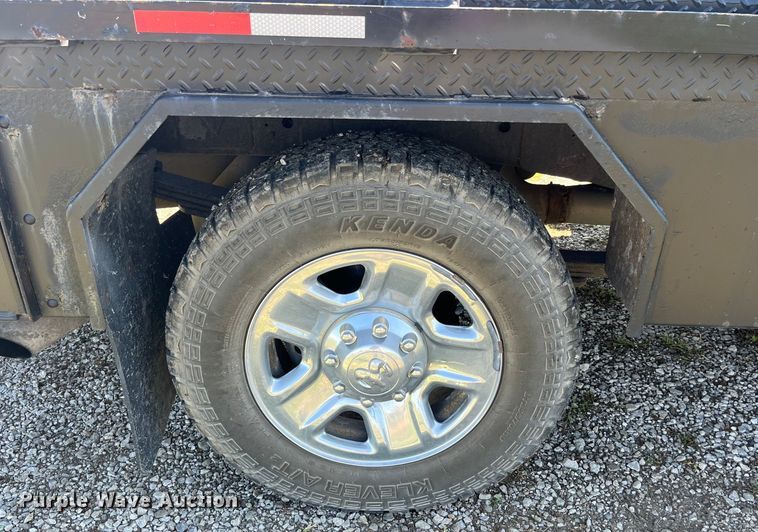 image for item EK8932 2015 Dodge Ram 3500HD Crew Cab flatbed pickup truck