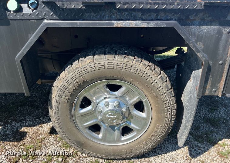 image for item EK8932 2015 Dodge Ram 3500HD Crew Cab flatbed pickup truck