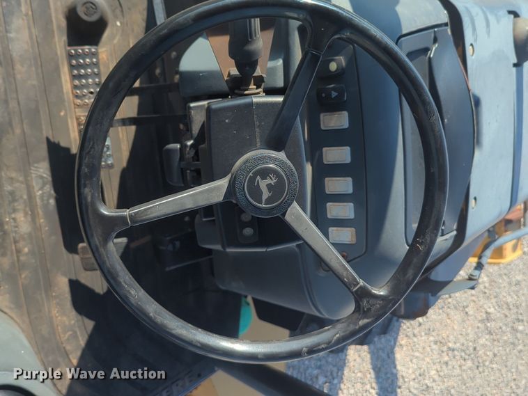 image for item DL1070 2011 John Deere  310SJ backhoe